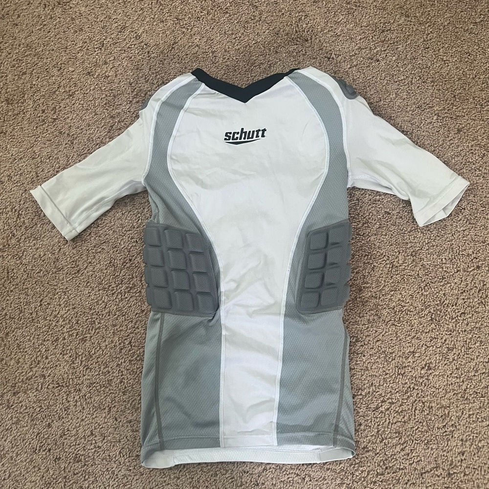 Schutt football protective compression shirt.